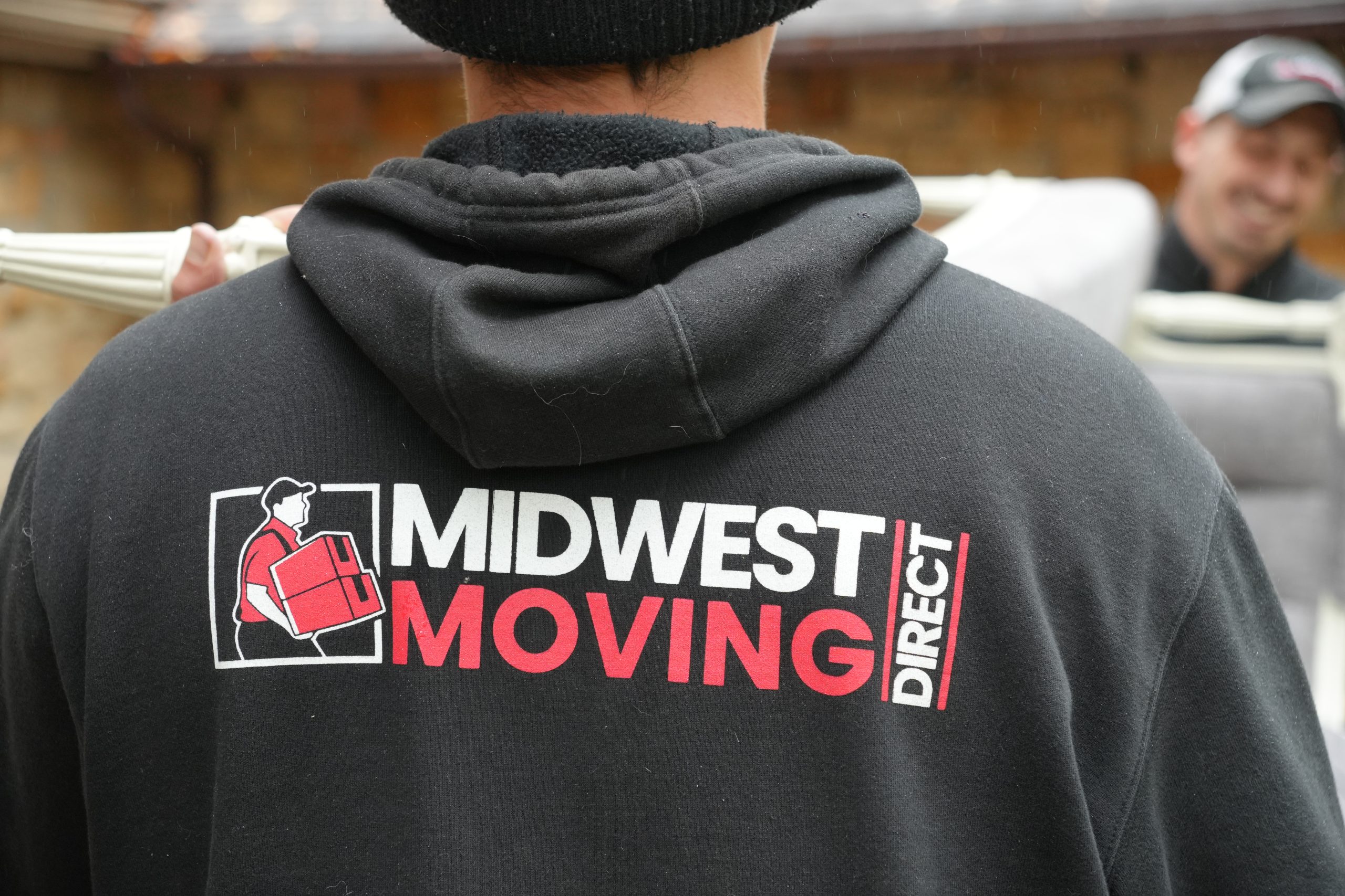 Person wearing Midwest Moving Direct hoodie in Akron Ohio Moving Services